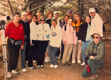 Gael leads a large group of visitors on a guided nature tour at Point Lobos, sharing her knowledge of the region’s coastal beauty, wildlife, and history.
